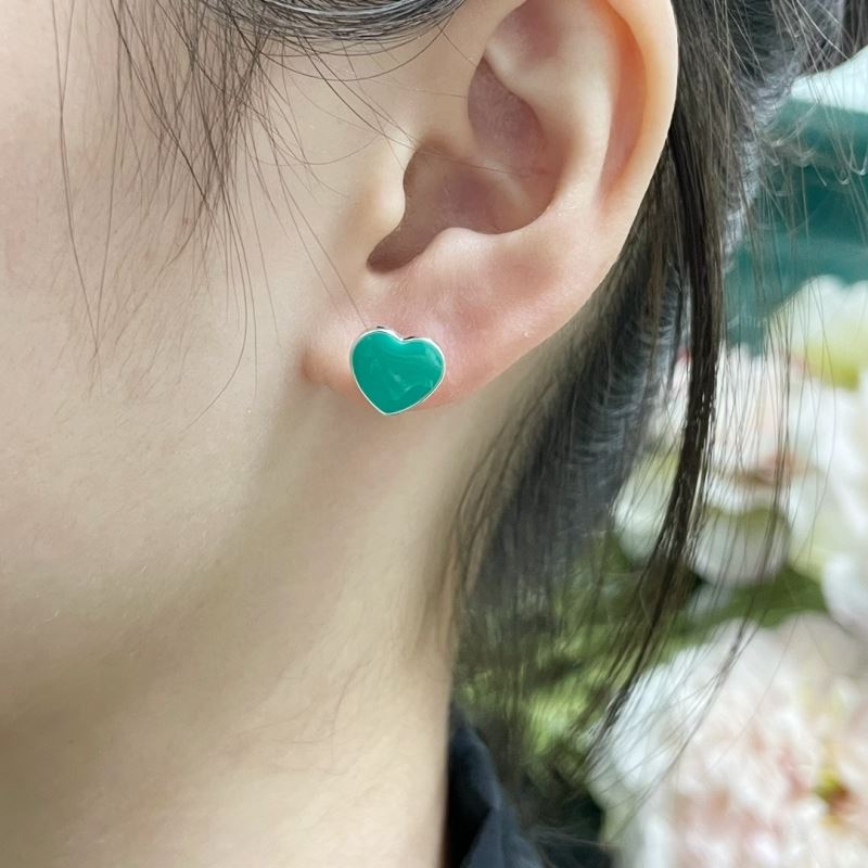 T*f*ny earrings
